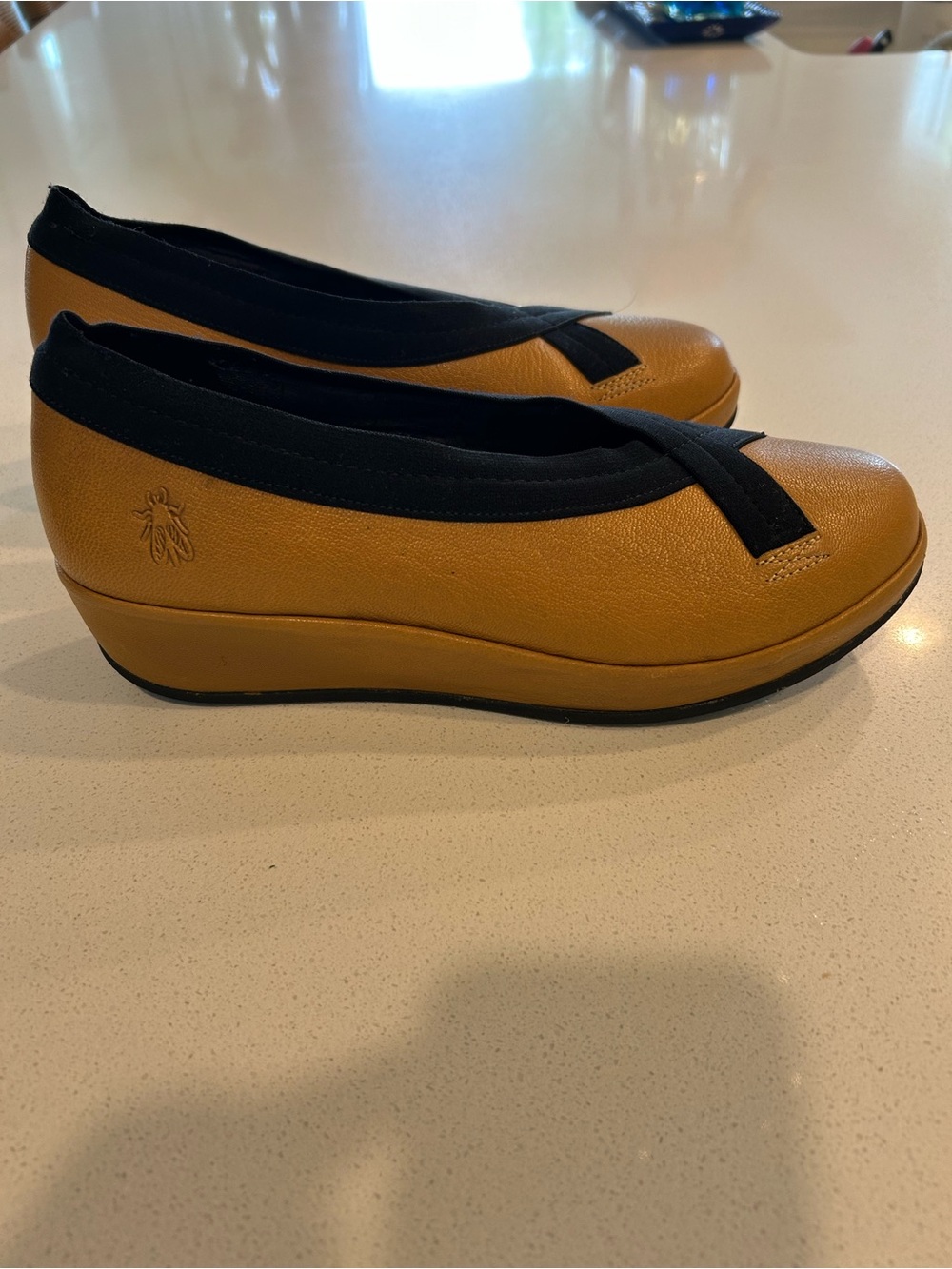 Fly London Mustard and Black Wedge with Cross-Strap
